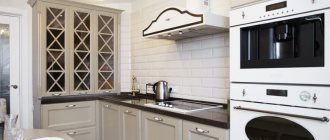 Bright kitchen with a hood in the style of modern classics